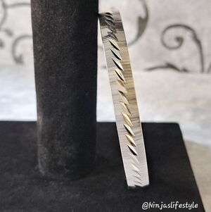 Vintage Monet Diamond Cut Silverplated Bangle